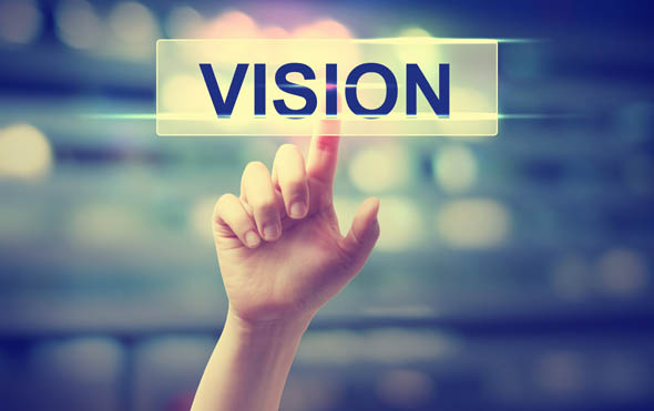 Vision concept with hand pressing a button on blurred abstract background